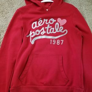 Aeropastel red jacket